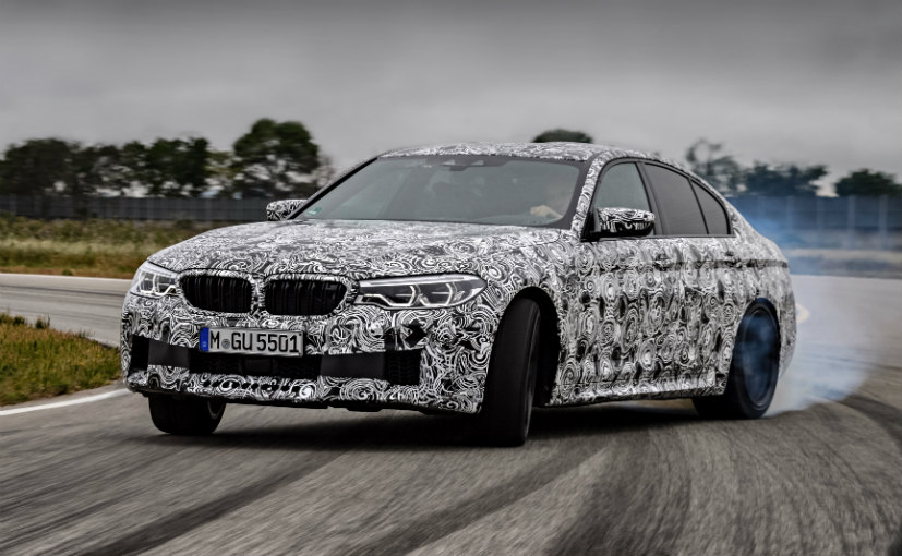 2018 BMW M5 The Most Advanced M5 Officially Teased front side profile while testing