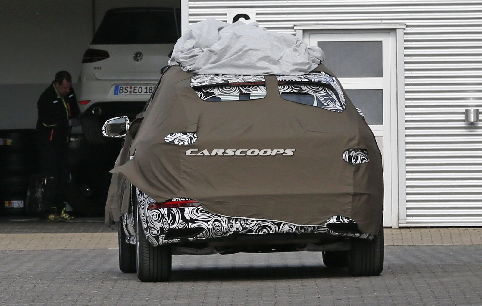 Audi Q3 Spied with heavy Camouflaged