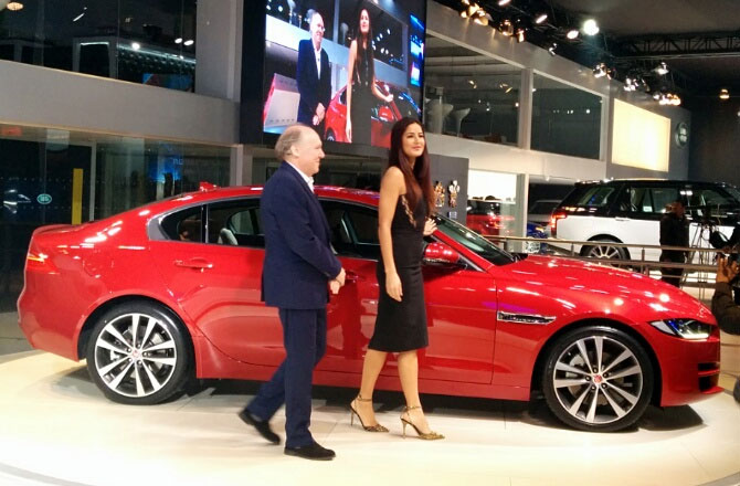 Actor Katrina Kaif Posing with the newly launched Jaguar XE at 2016 Auto Expo