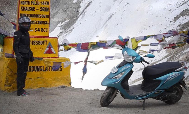 Anam Hashim with her TVS Scooty Zest at Khardung La Pass