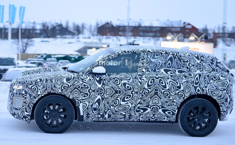 Camouflaged Jaguar E-Pace Compact Crossover Spotted testing Side Profile