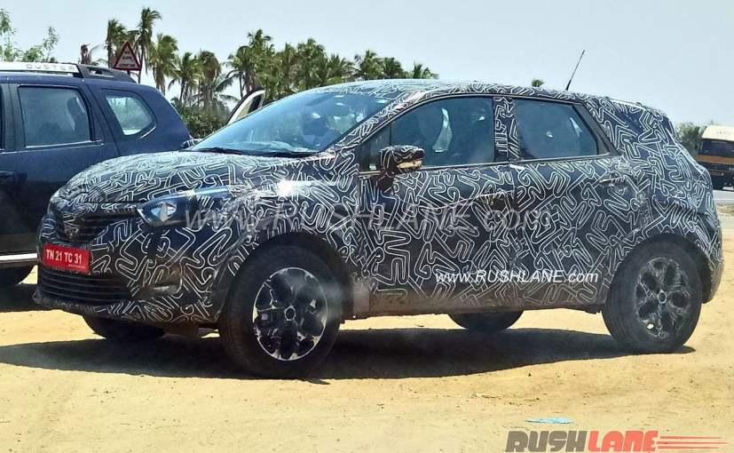 Camouflaged Renault Kaptur Spied Testing in India front side profile