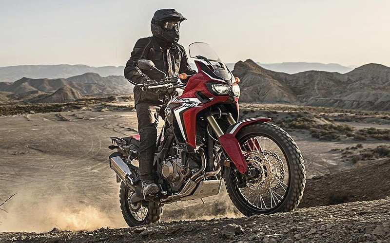 Honda Africa Twin performing rounds on rough and uneven terrain