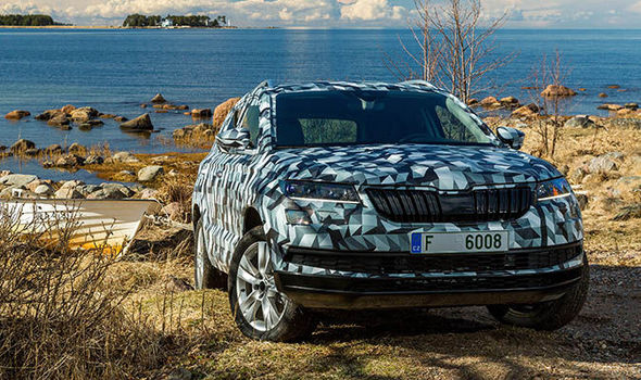 Skoda Karoq SUV Official Images Released Ahead of World Premiere camouflaged front fascia