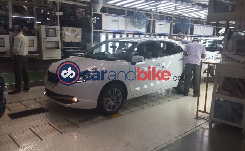 Maruti Suzuki Baleno Hybrid Spied at Production plant side Profile