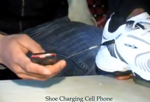 Shoe charging cell phone